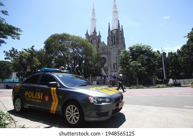 JAKARTA, INDONESIA-APRIL 2021-Combined Army and Police troops guard the church during Good Friday and Easter services on April 02, 2021 in Jakarta.