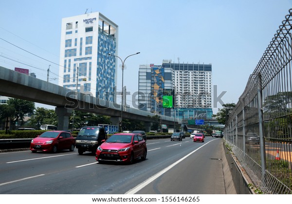 The\
Jakarta outer ring toll road between office buildings in South\
Jakarta, Indonesia was taken on 7 November\
2019