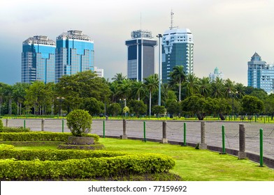 Jakarta Skyline In Public Park Garden In Bad Weather