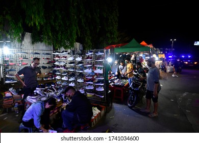 Jakarta street vendors put up temporary market stalls in front of one of the many crumbling buildings in Kota Tua Saturday night May 23, 2020 in Jakarta, Indonesia