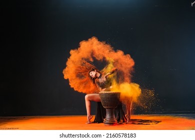 "Jakarta,DKI - Indonesia - March 07, 2022: Young woman playing music accompanied by powder dance