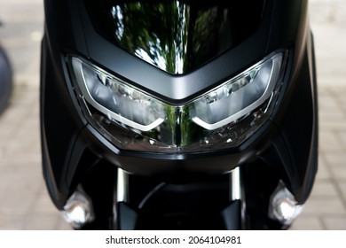 jakarta,indonesia,october 2021,head light of yamaha motorcycle with two bulb in the garage