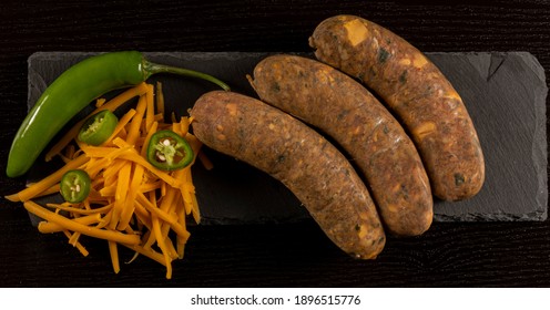 Jalapeno Cheddar Cheese Chorizo In Black Background