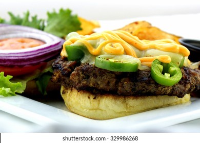 Jalapeno Cheese Burger Topped With Spicy Aioli.