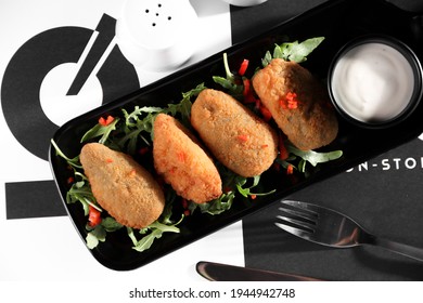 Jalapeno Poppers 
Plate Of Thick Spicy Fried Jalapeño Poppers, Top View