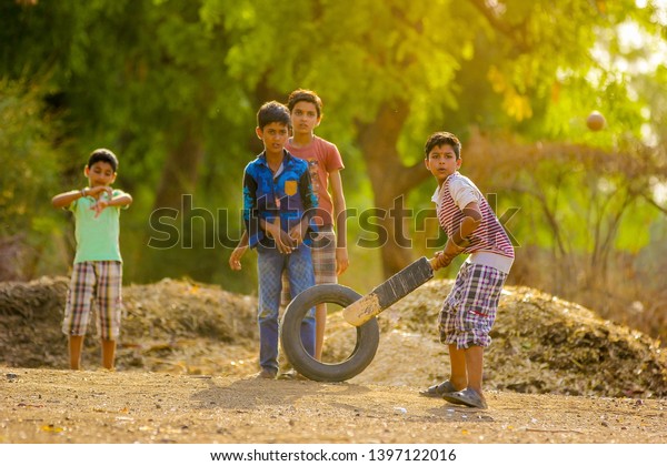 153 Indian Children Playing Cricket In Ground Images, Stock Photos ...