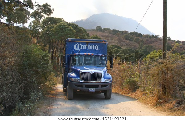 Jalisco/Mexico -\
October 2, 2019: a Corona beer truck in the countryside supplies\
the remote towns around a forest\
area