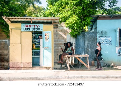 Jamaica, Caribbean Island, April 2015 - Jamaican People Waiting For The Bus. Shitty Bus Stop. Street Photography 