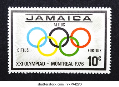 JAMAICA  CIRCA 1976: a postage stamp printed in Jamaica showing an image of the olympic rings with the latin words , citius, , circa 1976.