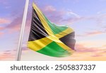 Jamaica national flag blowing with mast. The flag waving in beautiful sky. Jamaica national flag for independence day.