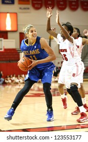 JAMAICA, NY-JAN 2: Delaware Blue Hens Guard Elena Delle Donne (11) Looks To Shoot Around St. John's Red Storm Guard Shenneika Smith (35) At Carnesecca Arena On January 2, 2013 In Jamaica, New York.