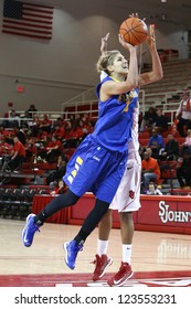 JAMAICA, NY-JAN 2: Delaware Blue Hens Guard Elena Delle Donne (11) Goes Up For A Shot Against The St. John's Red Storm At Carnesecca Arena On January 2, 2013 In Jamaica, Queens, New York.