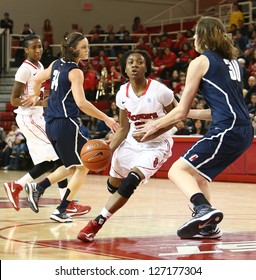 JAMAICA-FEB 2: St. John's Red Storm Guard Aliyyah Handford (3) Dribbles Around Connecticut Huskies Forward Breanna Stewart (30) At Carnesecca Arena On February 2, 2013 In Jamaica, Queens, New York.