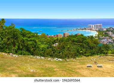 Jamaican Beach A. Caribbean beach on the northern coast of Jamaica, near Dunn's River Falls and the town of Ocho Rios.