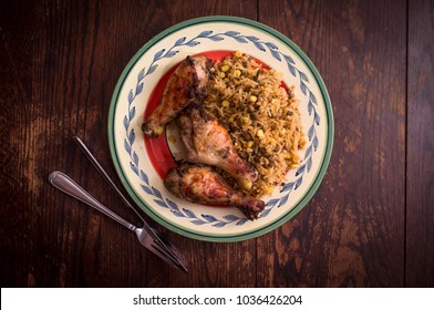 Jamaican Jerk Chicken Legs With Corn And Bean Rice