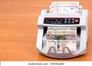  Jamaican Money In A Counting Machine
