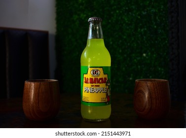 Jamaican Soft Drink On A Table With Two Wooden Cups Inside A Caribbean  Restaurant In LA  