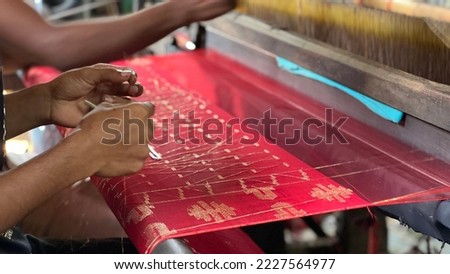Jamdani shari being weaved on a handloom.