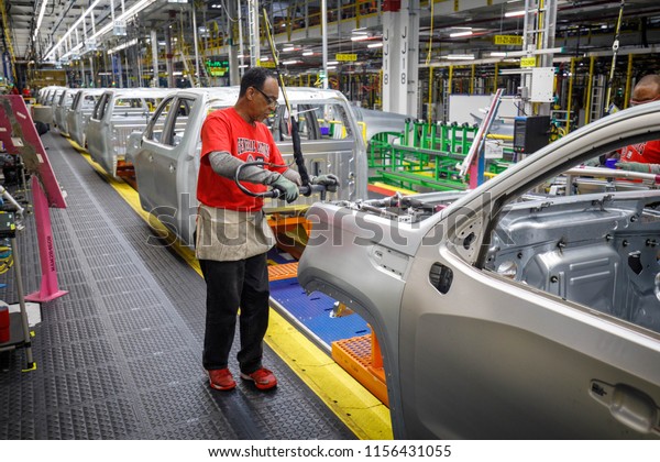 James O’Neal works\
in the body shop at GM\'s Chevrolet Silverado and GMC Sierra pickup\
truck plant in Fort Wayne, Indiana, U.S., July 25, 2018. Picture\
taken on July 25, 2018.