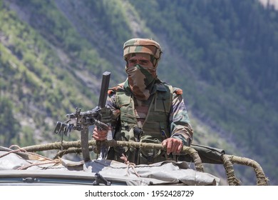 Jammu and Kashmir, India - june 12, 2015 : Indian frontier guard. Indian Army checkpoint in Kashmir Himalayas, India. Kashmir became dangerous again