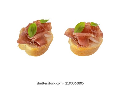 Jamon Sandwich Isolated On White Background. Spanish Meat In Thin Slices With Basil On A Piece Of White Loaf. Italian Prosciutto