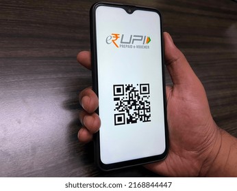 Jamshedpur, Jharkhand, India - June 18 2022: Indian Man Using E-RUPI UPI E-voucher For Digital Payment In India
