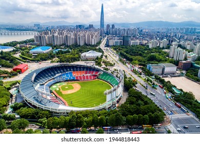 Jamsil, Songpa-gu, Seoul, South Korea - July 27, 2019: Aerial View Of Jamsil Baseball Stadium And Olympic Road With The Background Of Lotte World Tower
