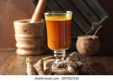 Jamu kunyit asem or Turmeric tamarind herbal medicine which is useful for relieving menstrual pain, as an anti-oxidant to treat stomach pain,soft focus texture,selective focus