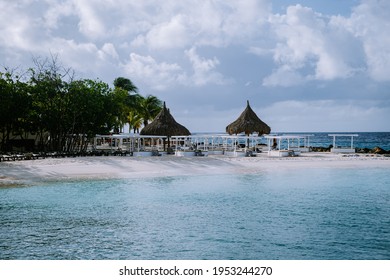 Jan Thiel Bay, Curacao People On The Jan Thiel Bay Beach On Curacao During Sunset Caribbean