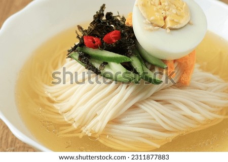 Janchi Guksu, Korean Banquet Party Noodle with Clear Broth Stock. Close Up.