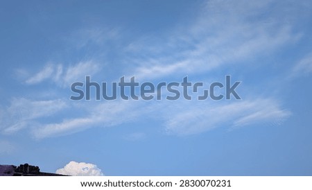 Jani write with blu sky with clouds beautiful sky seen 