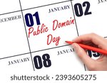 January 1. Hand writing text Public Domain Day on calendar date. Save the date. Holiday. Day of the year concept.