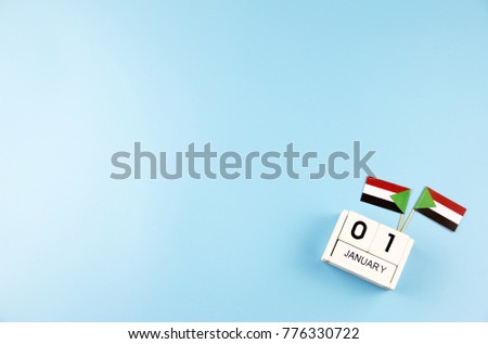 JANUARY 1 Wooden calendar Concept independence day of Sudan and Sudan national day with space for your text.