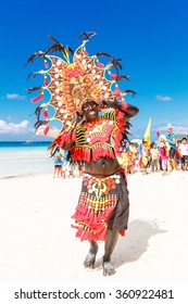 January 10th 2016. Boracay, Philippines. Festival Ati-Atihan. Unidentified people on parade in carnival costumes.