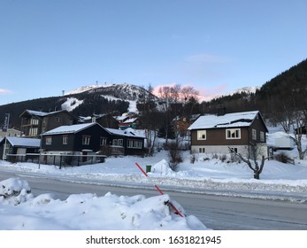 ÅRE/SWEDEN - JANUARY 16, 2020: Villa In Ski Resort Area On A Snow Mountain In A Clear Blue Sky Day During Winter Season.