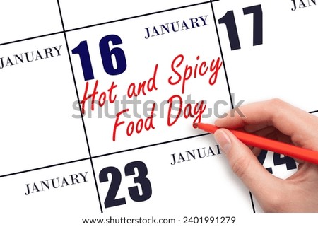 January 16. Hand writing text Hot and Spicy Food Day on calendar date. Save the date. Holiday.  Day of the year concept.
