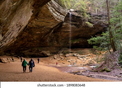 January 17th 2021 - Ohio - Tourists visit Ash Cave in Southeast Ohio at Hocking Hills State Park. 