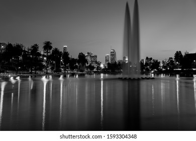 JANUARY 18, 2019 - LOS ANGELES, CALIFORNIA, USA - Echo Park, Los Angeles, California Features Fountain And Water Reflections Of LA Skyline - Black And White