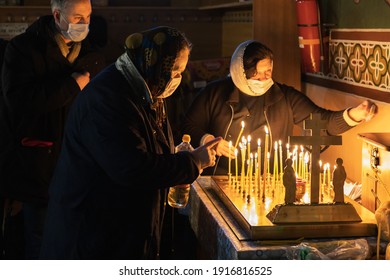 January 19, 2021 Balti Moldova Religious Holiday Of Baptism In The Church. Illustrative Editorial. Prayers In The Church Darkness By Candlelight.