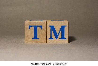 January 19, 2022. New York, USA. Stock Ticker Symbol Of Toyota Motor TM, Made Of Wooden Cubes, On A Gray Background.
