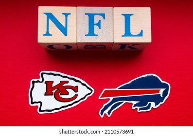 January 20, 2022. Kansas City, Missouri. The Emblems Of The Football Clubs Participating In The Playoffs Of The National Football League Buffalo Bills And Kansas City Chiefs On A Red Background.