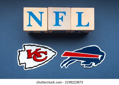 January 20, 2022. Kansas City, Missouri. The Emblems Of The Football Clubs Participating In The Playoffs Of The National Football League Buffalo Bills And Kansas City Chiefs On A Blue Background.