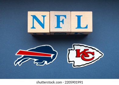 January 20, 2022. Kansas City, Missouri. The Emblems Of The Football Clubs Participating In The Playoffs Of The National Football League Buffalo Bills And Kansas City Chiefs On A Blue Background.