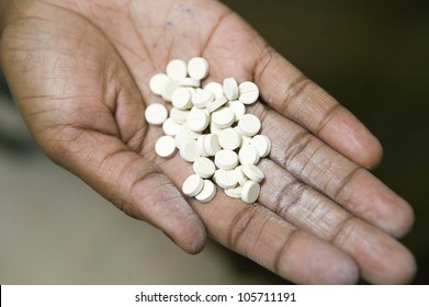 JANUARY 2007 - A Closeup Of A Hand Holds AIDS Pills At The Pepo La Tumaini Jangwani, HIV/AIDS Community Rehabilitation Program, Orphanage & Clinic. Nairobi, Kenya, Africa