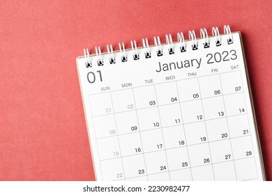 January 2023 calendar desk for the organizer to plan 2023 year on red background. - Shutterstock ID 2230982477