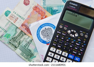 January 24, 2022, Voronezh, Russia: An Envelope With A Notification From The Federal Tax Service Of Russia, Ruble Banknotes And A Casio Calculator