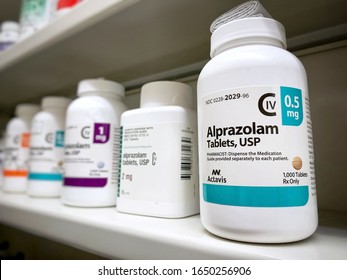 January 26, 2020-Ogden Utah USA: alprazolam bottle on shelf. Alaprazolam also known as Xanax is a drug which is a benzodiazepine and is well known for its street value and addiction potential.