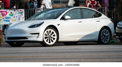 January 2nd , 2022 - Austin , Texas , USA: Tesla Model 3 Parked Street Side Along The Famous South Congress Avenue