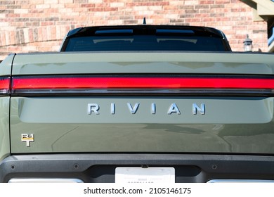 January 2nd , 2022 - Austin , Texas , USA: Tailgate of the Rivian R1T Quad Motor All Electric truck , the First Electric Truck to hit the market and delivered to customers