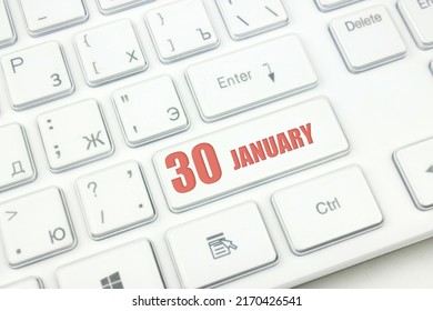 January 30th. Day 30 Of Month, Calendar Date. Cropped View Of Modern White Computer Keyboard With Calendar Date. Concept Workspace, Freelance, Deadline.  Winter Month, Day Of The Year Concept